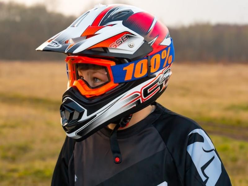 a close up of a person wearing a helmet